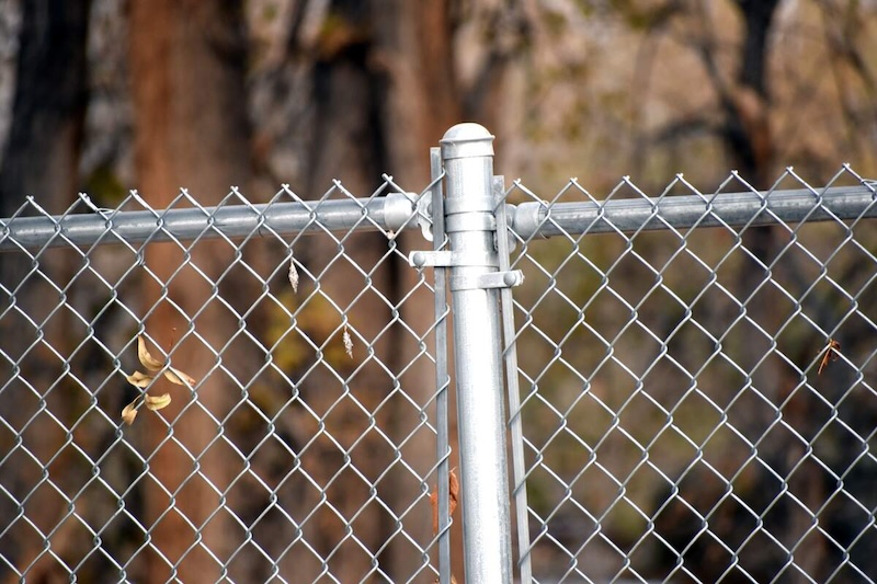 chain link fence with post and tension bar