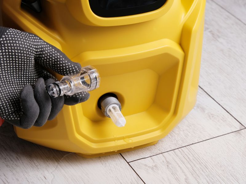 Cleaning the filter on a pressure washer close-up